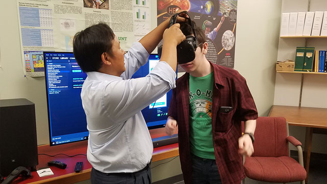 Student learning about VR headsets